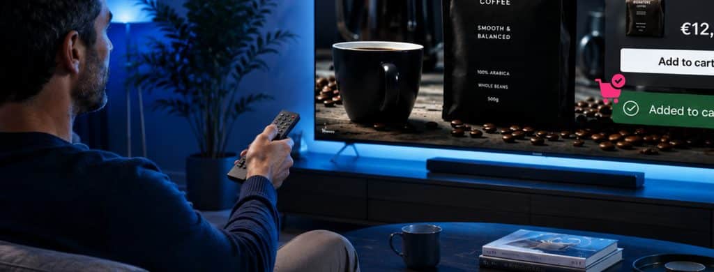 Viewer using Broadpeak Click2Cart to add a product to their cart directly from a shoppable CTV advertisement.
